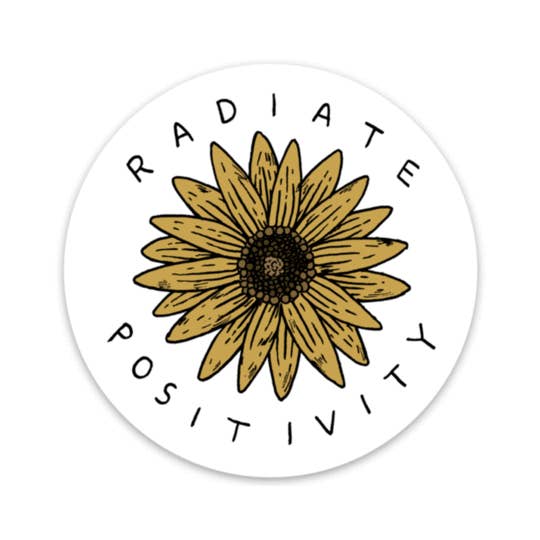 A circular white sticker with a sunflower in the middle and the words "radiate positivity" circling the flower.